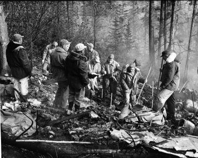 Fairchild airmen who had hoped to take part in a rescue mission became members of a salvage crew on Sept. 12, 1962, as they worked on the grim task of removing 44 bodies on Mount Kit Carson. 