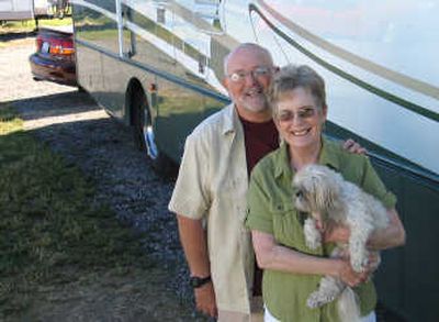 
Diana and Jim Garot of Palmdale, Calif., with their Shih-tzu, China, stopped off in Coeur d'Alene on their three-month RV trip around the United States.
 (Photos by Julianne Crane / The Spokesman-Review)