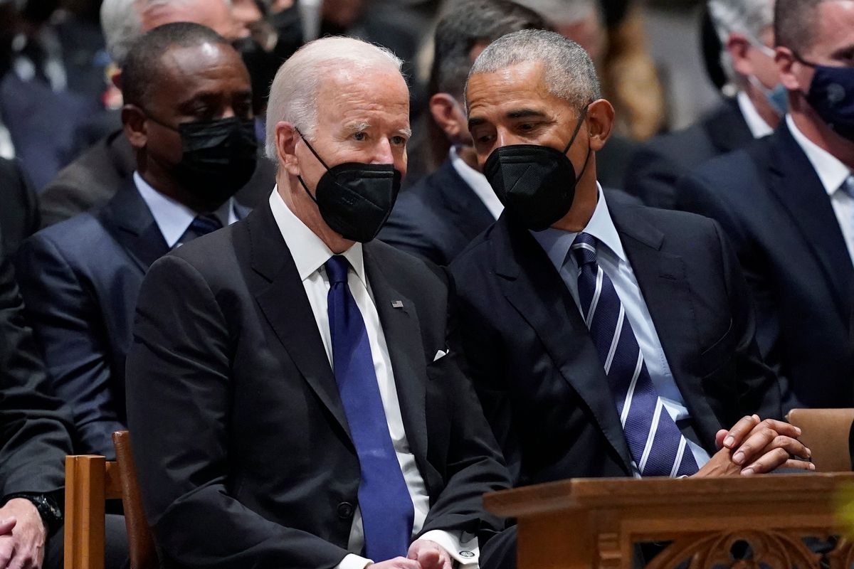 President Joe Biden, left, talks with former President Barack Obama, before the start of the funeral service for former Secretary of State Madeleine Albright at the Washington National Cathedral, Wednesday, April 27, 2022, in Washington. Former President Bill Clinton and former Secretary of State Hillary Clinton are right.  (Evan Vucci)