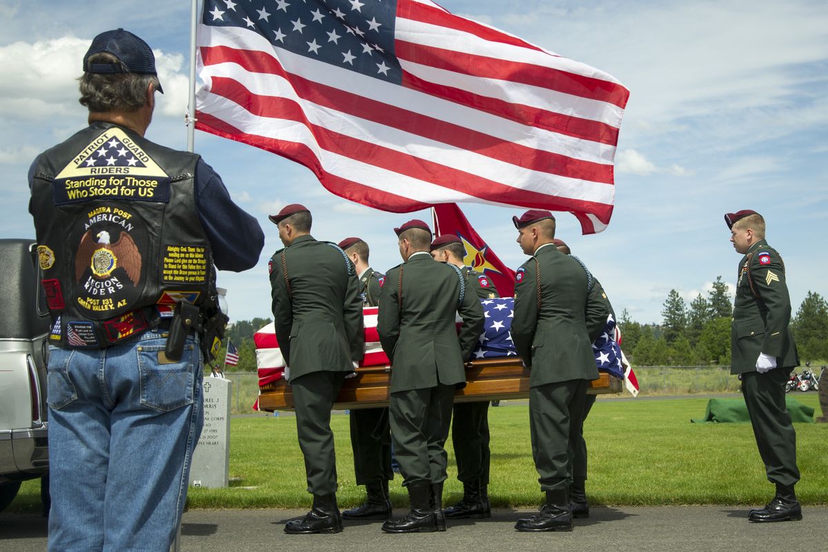 A U.S. Army 82nd Airborne honor guard removes Spc. Jarrod Lallier’s casket from a hearse at Fairmount Memorial Park Cemetery on Monday. Lallier, 20, of Spokane, was killed in Afghanistan when men dressed as Afghan police turned their weapons against his unit.