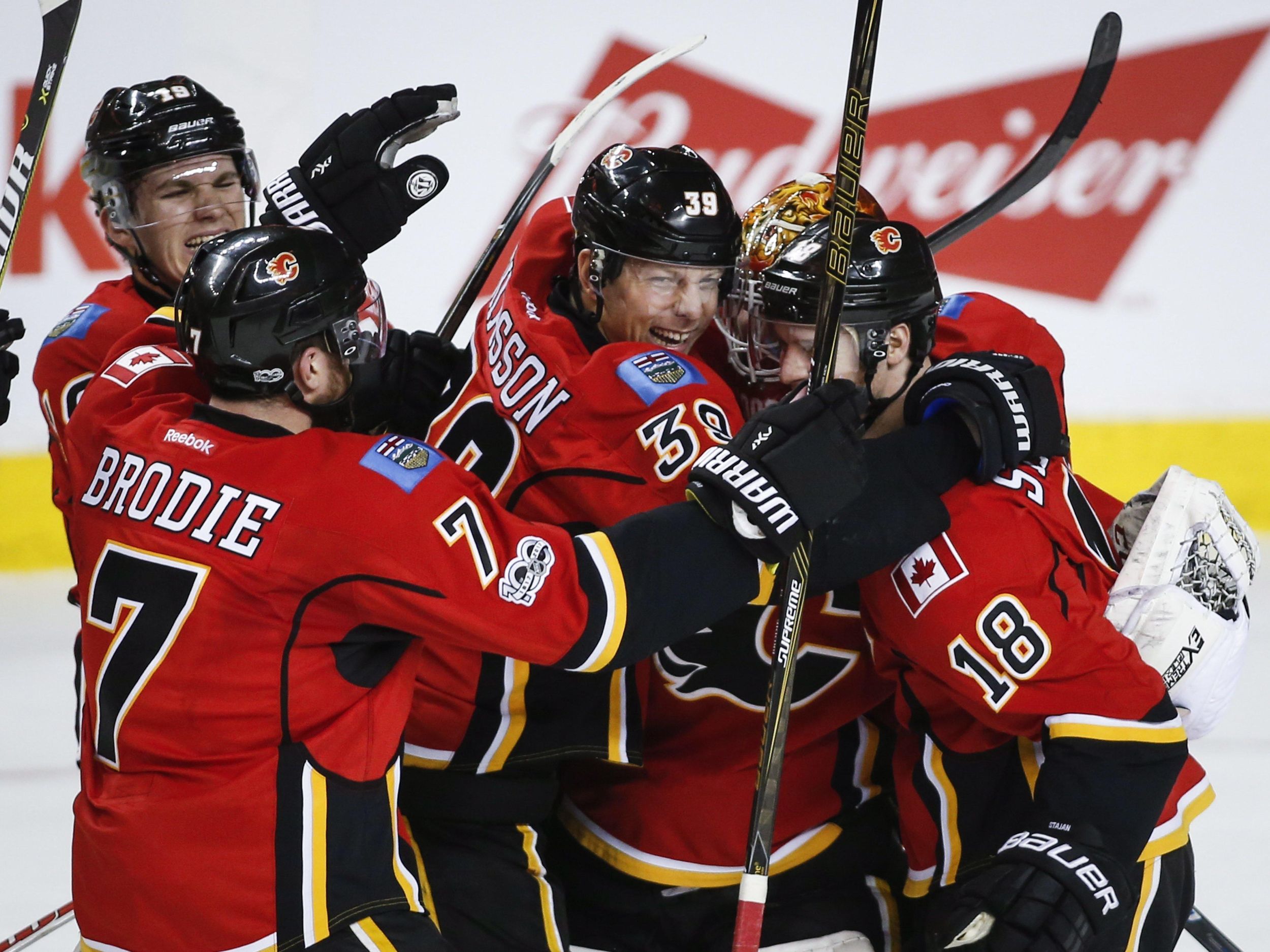 Coyotes beat Flames 4-3 in overtime to extend points streak to six