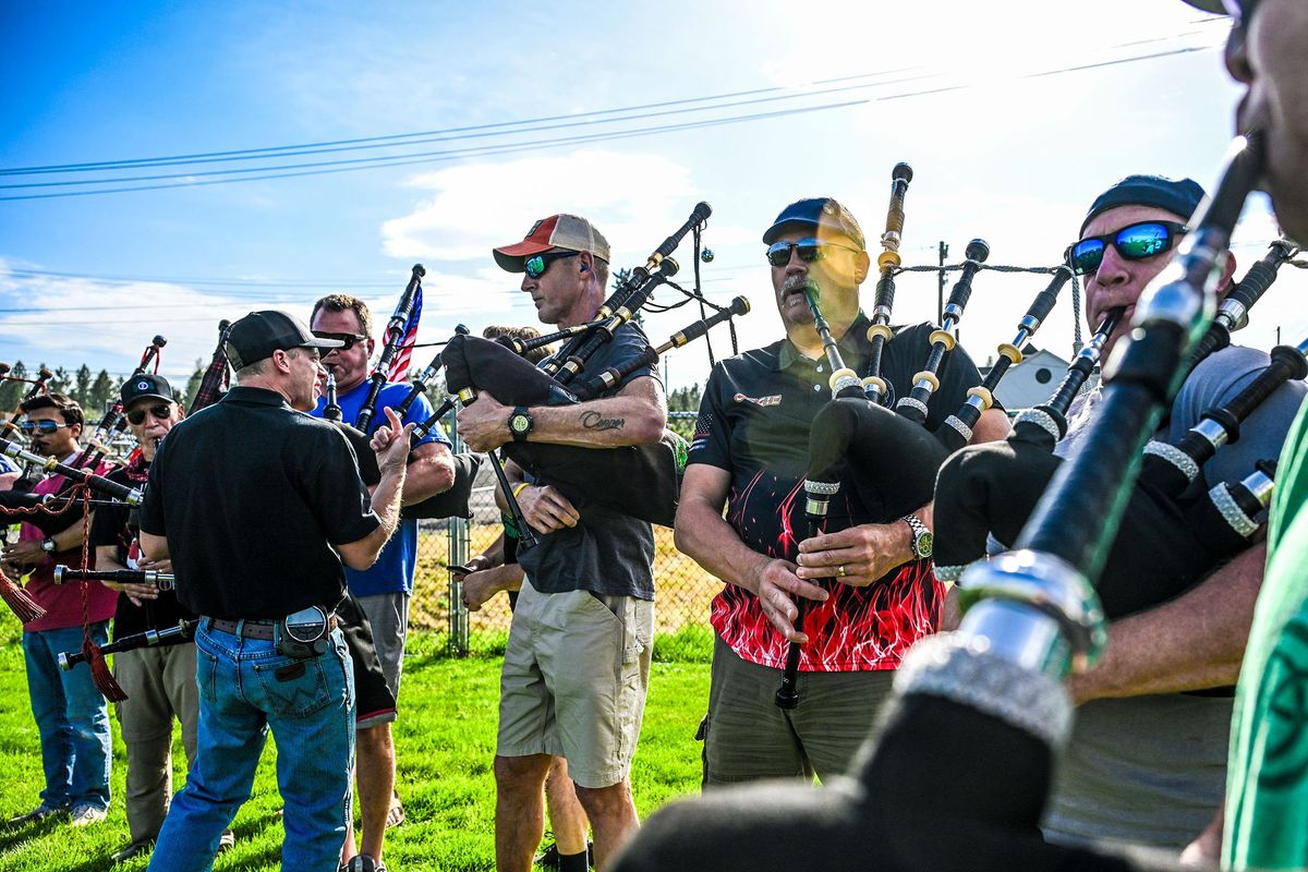 Bagpipers practice at Jenny Stokes Field in Coeur d’Alene on Wednesday in preparation for the funerals of Coeur d’Alene Fire Battalion Chief John Morrison and Kootenai County Fire & Rescue Chief Frank Harwood. (Kathy Plonka/The Spokesman-Revie)