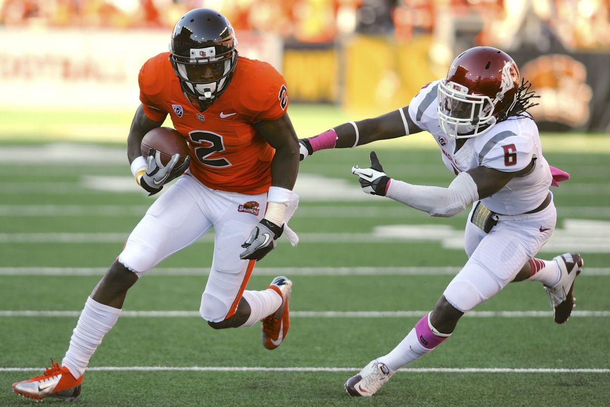 Oregon State's Markus Wheaton runs against Washington State's Damante Horton (6) during the first half of an NCAA college football game in Corvallis, Ore., Saturday, Oct 6, 2012. (Greg Wahl-stephens / Fr29287 Ap)