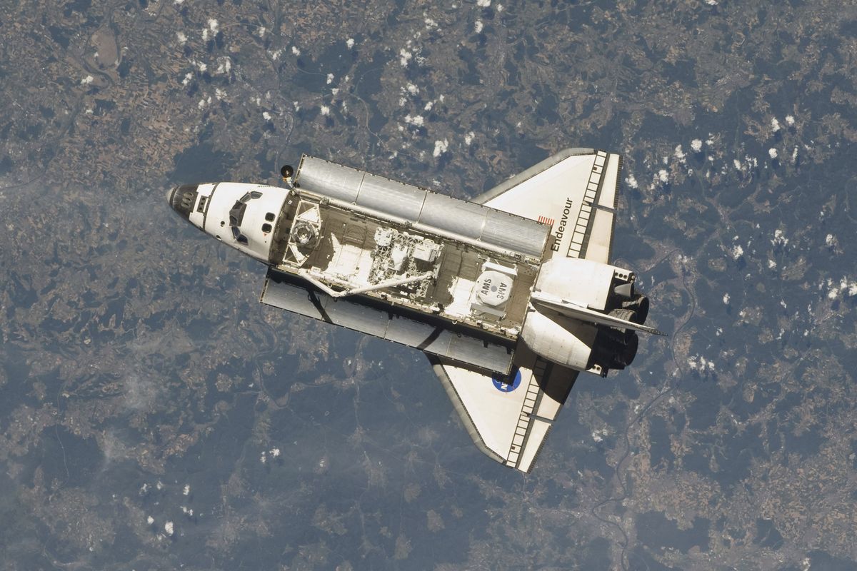FILE - In this Wednesday, May 18, 2011 photo provided by NASA taken by one of the Expedition 27 crew members aboard the International Space Station, the space shuttle Endeavour prepares to dock with the facility. At sunrise Monday, Sept. 17, 2012, the spacecraft will depart NASA