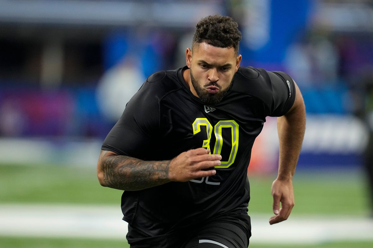 Washington State lineman Abraham Lucas runs a drill during the NFL football scouting combine in March in Indianapolis.  (Associated Press)