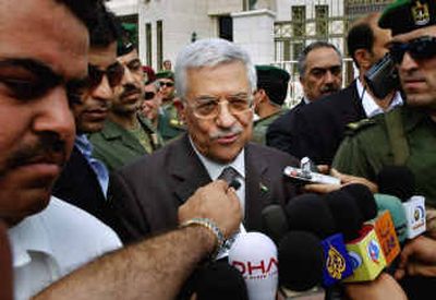 
Palestinian Authority President Mahmoud Abbas speaks to journalists upon his arrival at his residence in the West Bank city of Ramallah on Friday. Abbas, 70, said Friday that he plans to appoint a deputy.
 (Associated Press / The Spokesman-Review)