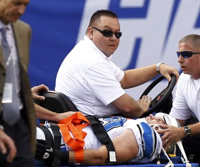 Detroit Lions' linebacker Zack Follett is taken off the field on a stretcher after being injured on Sunday. (Associated Press)