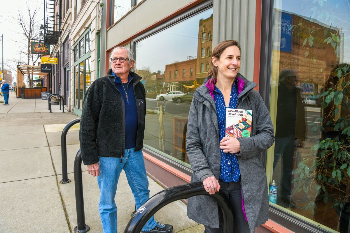 In a new book, “One-Block Revolution,” several contributors write about their experiences related to the Community Building on West Main Avenue in downtown Spokane. The center was started by attorney Jim Sheehan, left, and has hosted many nonprofits. Summer Hess, right, is the book’s editor.  (DAN PELLE/THE SPOKESMAN-REVIEW)