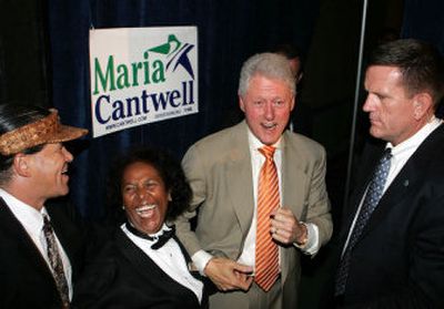 Convention center employees joke with former President Bill Clinton after he mentioned the staff in his speech at a fundraiser in Seattle on Monday.
(Associated Press / The Spokesman-Review)