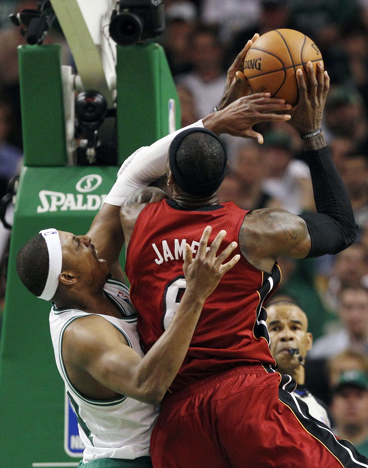 Celtics forward Paul Pierce, left, had no defense against Heat star LeBron James, who made 19 of 26 shots. (Associated Press)
