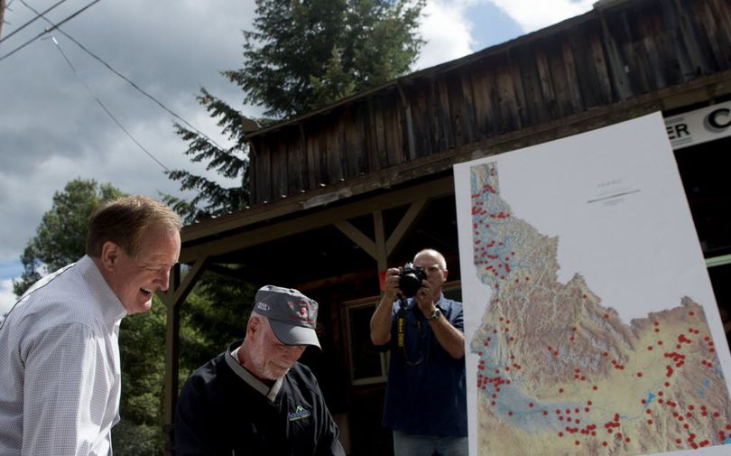 Idaho Senator Mike Crapo, left shares a laugh with Wardner Mayor Joe Guardipee after holding a town hall meeting at Wardner City Hall on Thursday, September 1, 2016. Crapo announced his intention to hold a town meeting in every incorporated city in Idaho about 22 months ago. Wardner, Idaho was number 200.  (Kathy Plonka)