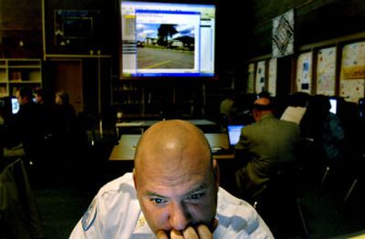 
Ralph Kramer, deputy chief of operations for Northern Lakes Fire District, studies the Rapid Responder software at Woodland Middle School in Coeur d'Alene on Wednesday. The software is meant for use in response to emergency situations. 
 (Kathy Plonka / The Spokesman-Review)