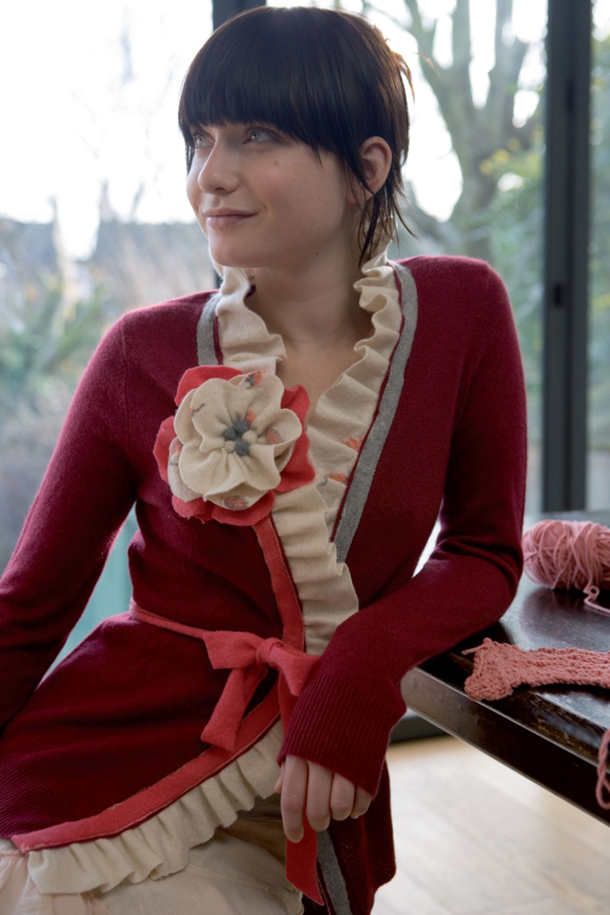 Kayte Terry, the author of “Complete Embellishing: Techniques and Projects,” suggests adding a ruffle to the placket, or opening, of a cardigan, as shown in this photo from her book. Courtesy of Creative Homeowner (Courtesy of Creative Homeowner / The Spokesman-Review)
