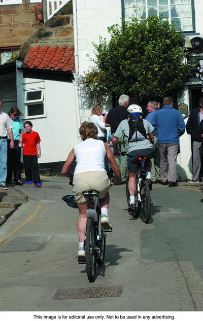 Riding a bike to run errands or even commute to the office is a great way to get exercise and help the environment at the same time.  (Metrocreative)