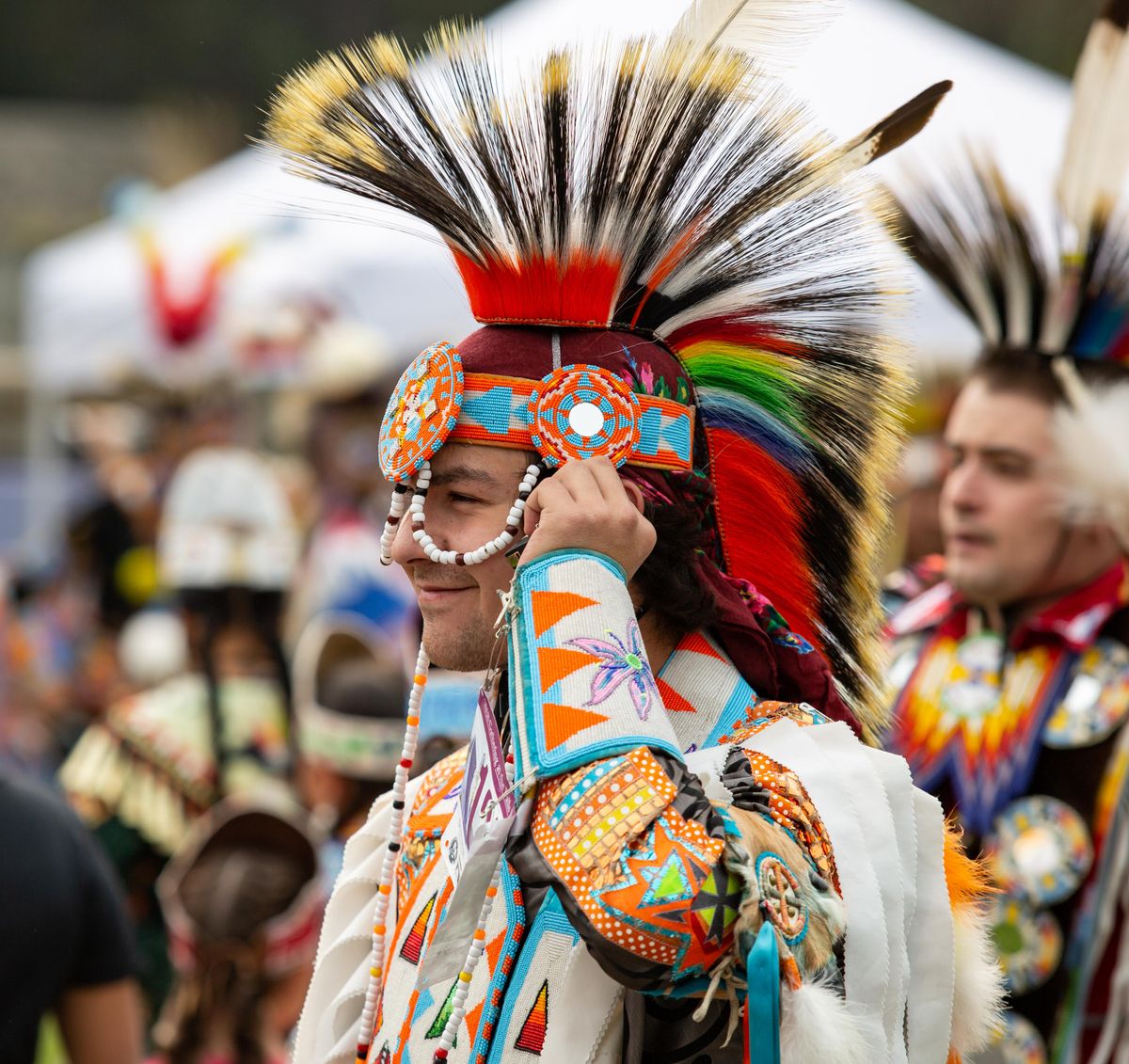 Alec Bluff smiles while dancing at the Gathering at the Falls powwow in Riverfront Park
