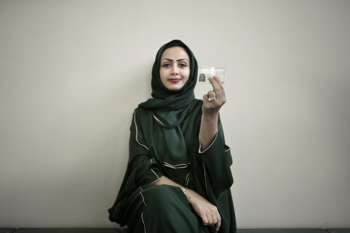 Asmaa al-Assdmi, 34, poses for a photograph holding her new driver’s license at the Saudi Driving School inside Princess Nora University on Saturday, June 23, 2018, in Saudi Arabia. (Nariman El-Mofty / Associated Press)