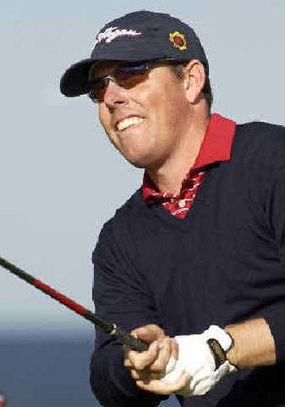 
Co-leader Justin Leonard concentrates on his drive on No. 9. 
 (Associated Press / The Spokesman-Review)