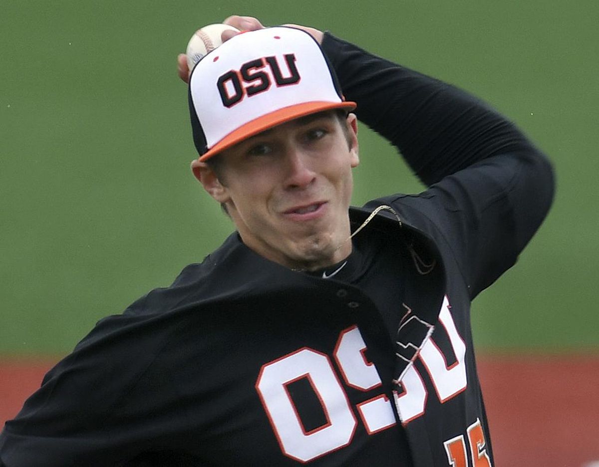 FILE - In this March 4, 2017, file photo, Oregon State pitcher Luke Heimlich throws during an NCAA college baseball gameMarch 4, 2017, against UC Davis in Corvallis, Ore. Heimlich, who as a teenager pleaded guilty to molesting a 6-year-old girl, will not accompany the Beavers to the College World Series. The 21-year-old left-hander made the announcement in a statement released through a representative for his family. He called going to the series something that he and his teammates have worked toward all year. (Mark Ylen / AP)