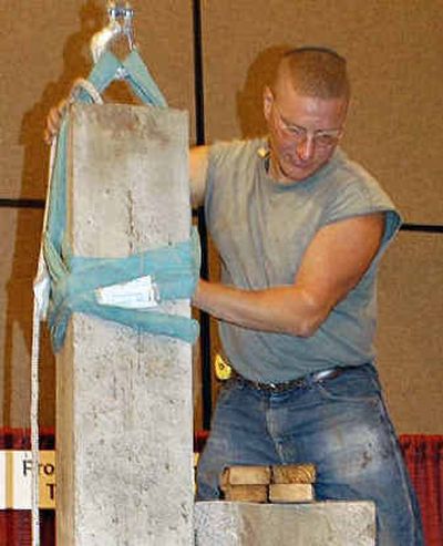 
Nick Berg is seen helping set up at an engineering conference he attended in Hershey, Pa., in this Oct. 2003 photo. Berg's decapitated body was found Saturday. Nick Berg is seen helping set up at an engineering conference he attended in Hershey, Pa., in this Oct. 2003 photo. Berg's decapitated body was found Saturday. 
 (Associated PressAssociated Press / The Spokesman-Review)