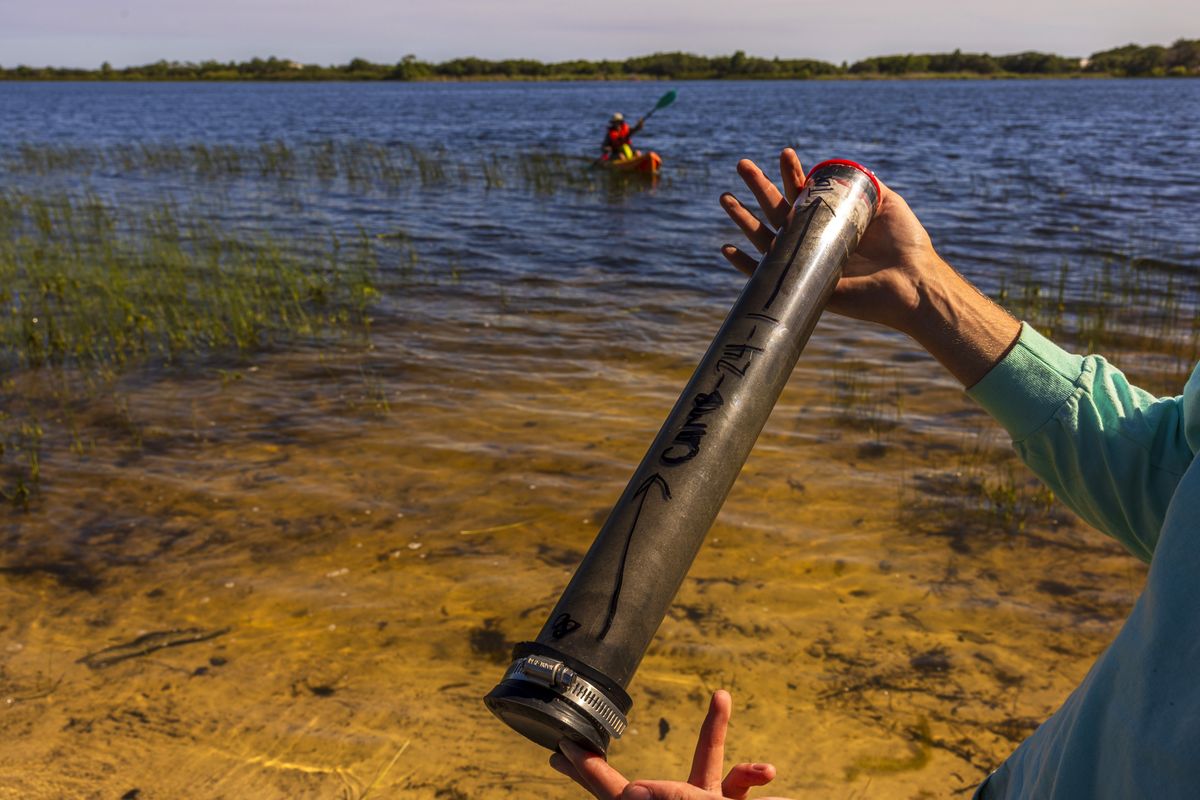 A sediment core extracted from the bottom of Campbell Lake.   (Saul Martinez/for The Washington Post)
