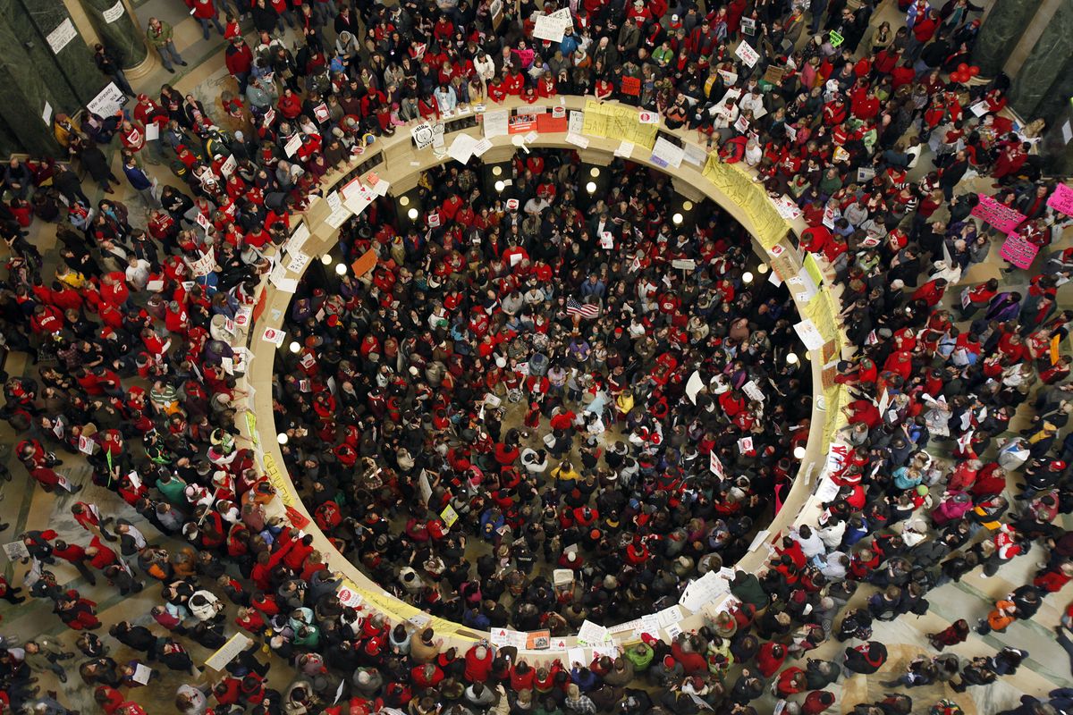 Massive protests at the Wisconsin Capitol in Madison entered a fourth day as demonstrators vowed to stay as long as needed to get the concessions they want in a dispute over proposed changes to government workers unions. (Associated Press)