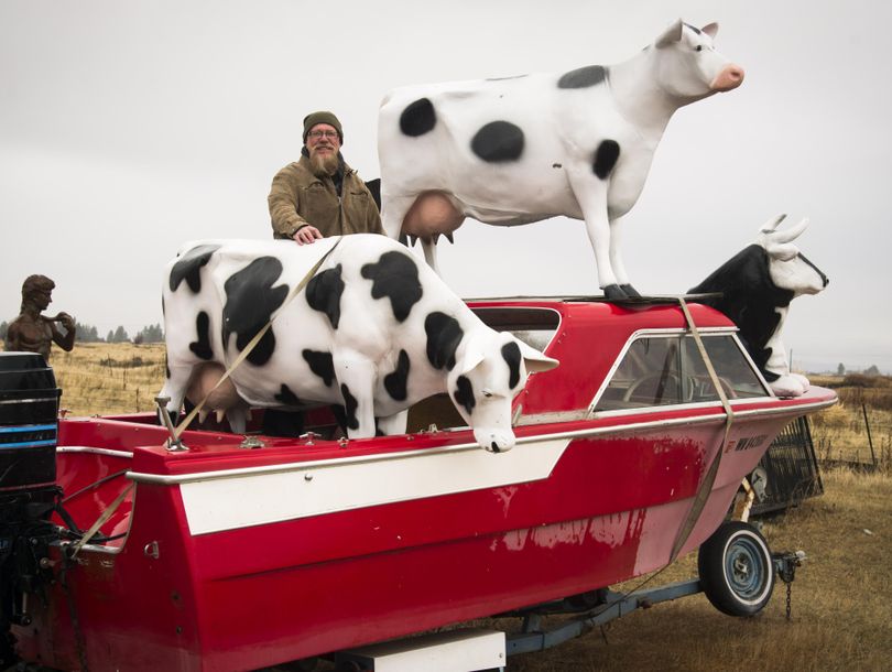 These cows on a motor boat turn heads for drivers heading west on I-90. Way Out West, owned by Mike Ferguson, sells a huge variety of traditional and funky-style statuary. (Colin Mulvany / The Spokesman-Review)