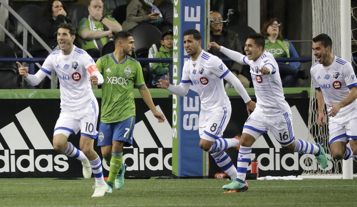 Montreal Impact forward Jeisson Vargas, second from right, celebrates with teammates after he scored a goal against the Seattle Sounders with an assist from Ignacio Piatti, left, during the second half of an MLS soccer match, Saturday, March 31, 2018, in Seattle. The Impact won 1-0. (Ted S. Warren / Associated Press)