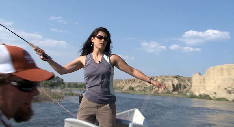 Trout TV host Hilary Hutcheson of Columbia Falls, Mont., casts while filming an episode on the North Platte River in Wyoming.