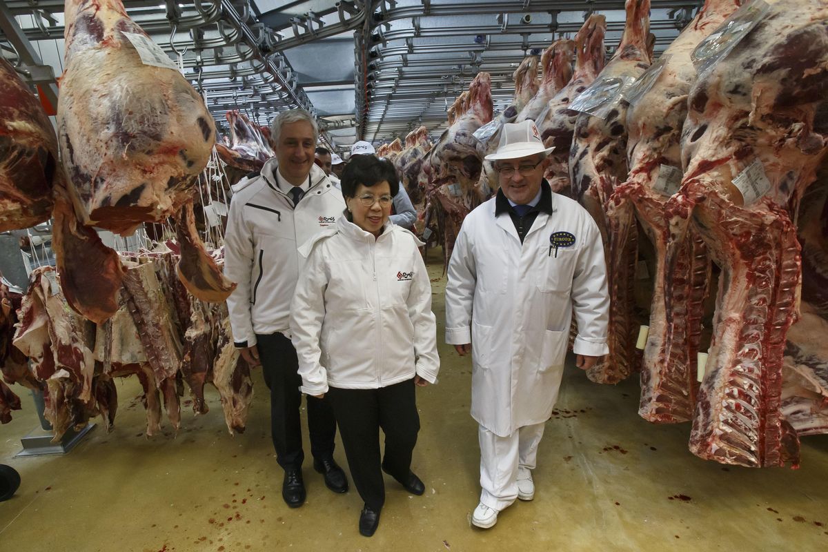 World Health Organization chief Margaret Chan, center, visits the Rungis international market on April 7, 2015, to mark the World Health Day in Rungis, outside Paris, France. WHO routinely spends about $200 million a year on travel, far more than what it doles out to fight some of the biggest problems in public health including AIDS, tuberculosis and malaria, according to internal documents obtained by the Associated Press, published Sunday, May 21, 2017. (Michel Euler / Associated Press)