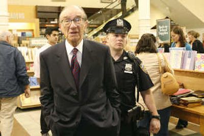 
Former Federal Reserve Chairman Alan Greenspan arrives at a signing for his book 