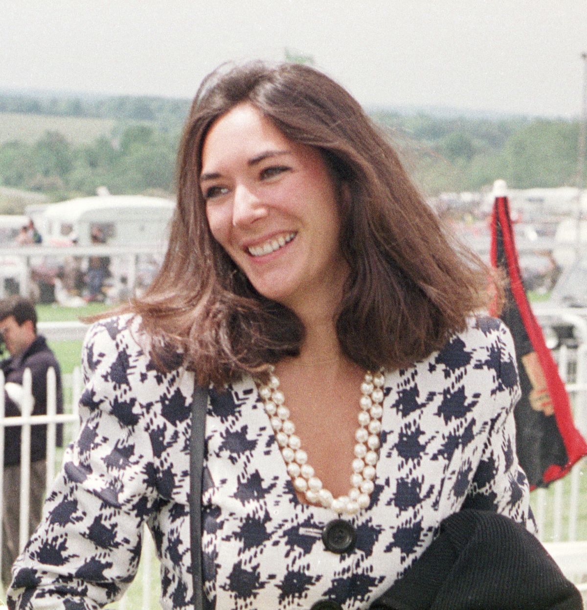 FILE - In this June 5, 1991 file photo, British socialite Ghislaine Maxwell arrives at Epsom Racecourse. Jeffrey Epstein’s former girlfriend will face a judge and at least one of her accusers by video at a hearing to determine whether she stays behind bars until trial on charges she recruited girls for the financier to sexually abuse a quarter-century before he killed himself in a Manhattan jail. The hearing Tuesday, July 14, 2020, in Manhattan federal court was expected to feature a not guilty plea by Maxwell along with arguments over whether she