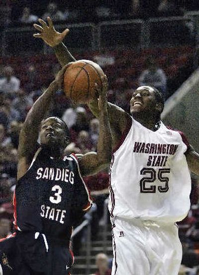 
San Diego State's Richie Williams works against WSU's Kyle Weaver. 
 (Associated Press / The Spokesman-Review)