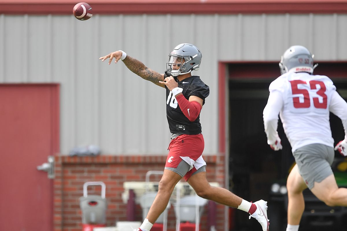Washington State Cougars quarterback Jarrett Guarantano (18) throws during practice on Friday, Aug. 6, 2021, at Rogers Field in Pullman, Wash.  (Tyler Tjomsland/The Spokesman-Review)