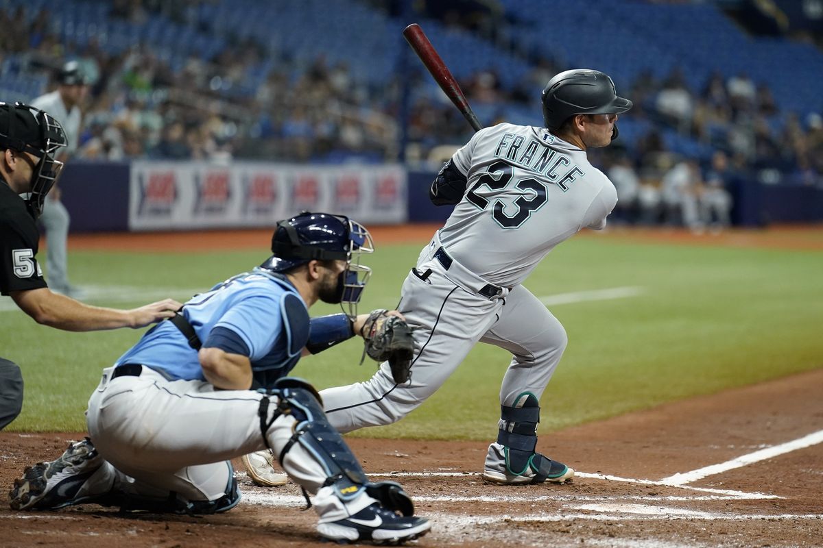 Mariners’ Ty France lines an RBI single off Rays’ Michael Wacha during the third inning of a baseball game Monday in St. Petersburg, Fla.  (Chris O