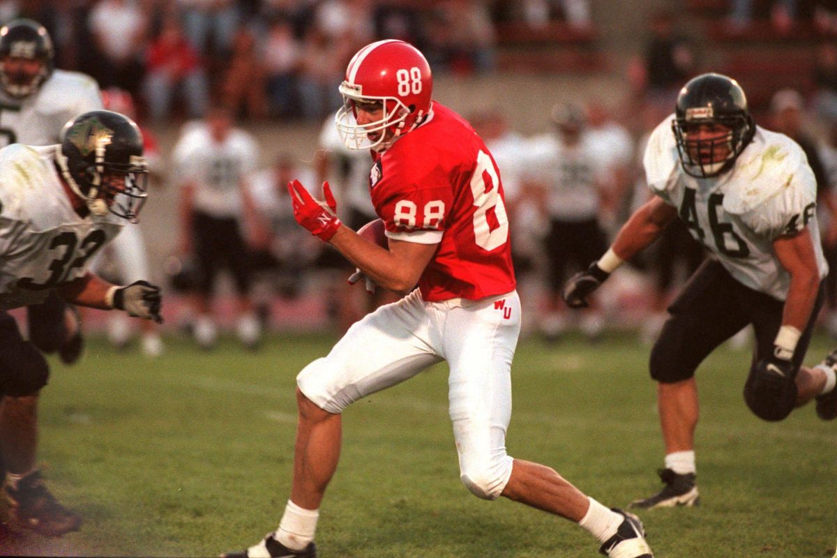 Eastern Washington’s Jeff Ogden runs against Rocky Mountain College in a game on Sept. 6, 1997. (Dan Pelle / The Spokesman-Review)