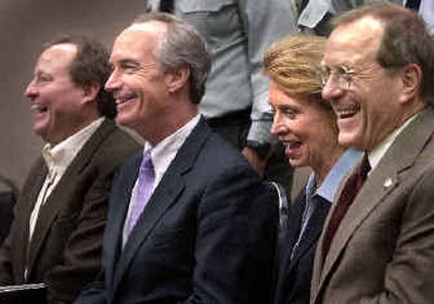 
Northwest governors, from left, Brian Schweitzer, of Montana, Dirk Kempthorne, of Idaho, Christine Gregoire, of Washington, and Ted Kulongoski, of Oregon, met in Spokane on Wednesday.
 (Associated Press / The Spokesman-Review)