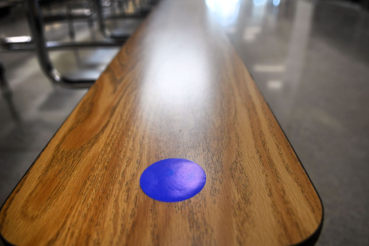 Blue dots indicate seats for social distancing at Northwest Expedition Academy in Coeur d’Alene on Friday,Sept. 4, 2020. (Kathy Plonka/The Spokesman-Review)