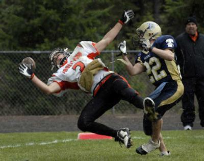 
Timberlake's Cody Jones, right, breaks up a short pass to Fruitland's Nate Bake in the end zone in the first half on Saturday. 
 (Jesse Tinsley / The Spokesman-Review)