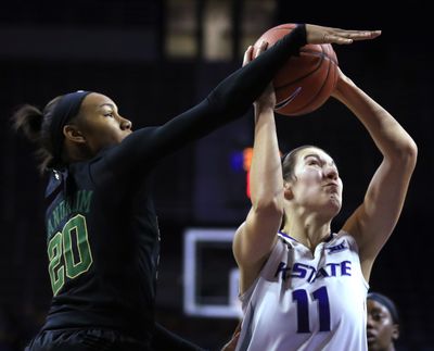 Kansas State forward Peyton Williams (11) is fouled by Baylor guard Calveion Landrum (20) during the second half of an NCAA college basketball game in Manhattan, Kan., Wednesday, Jan. 25, 2017. (Orlin Wagner / Associated Press)