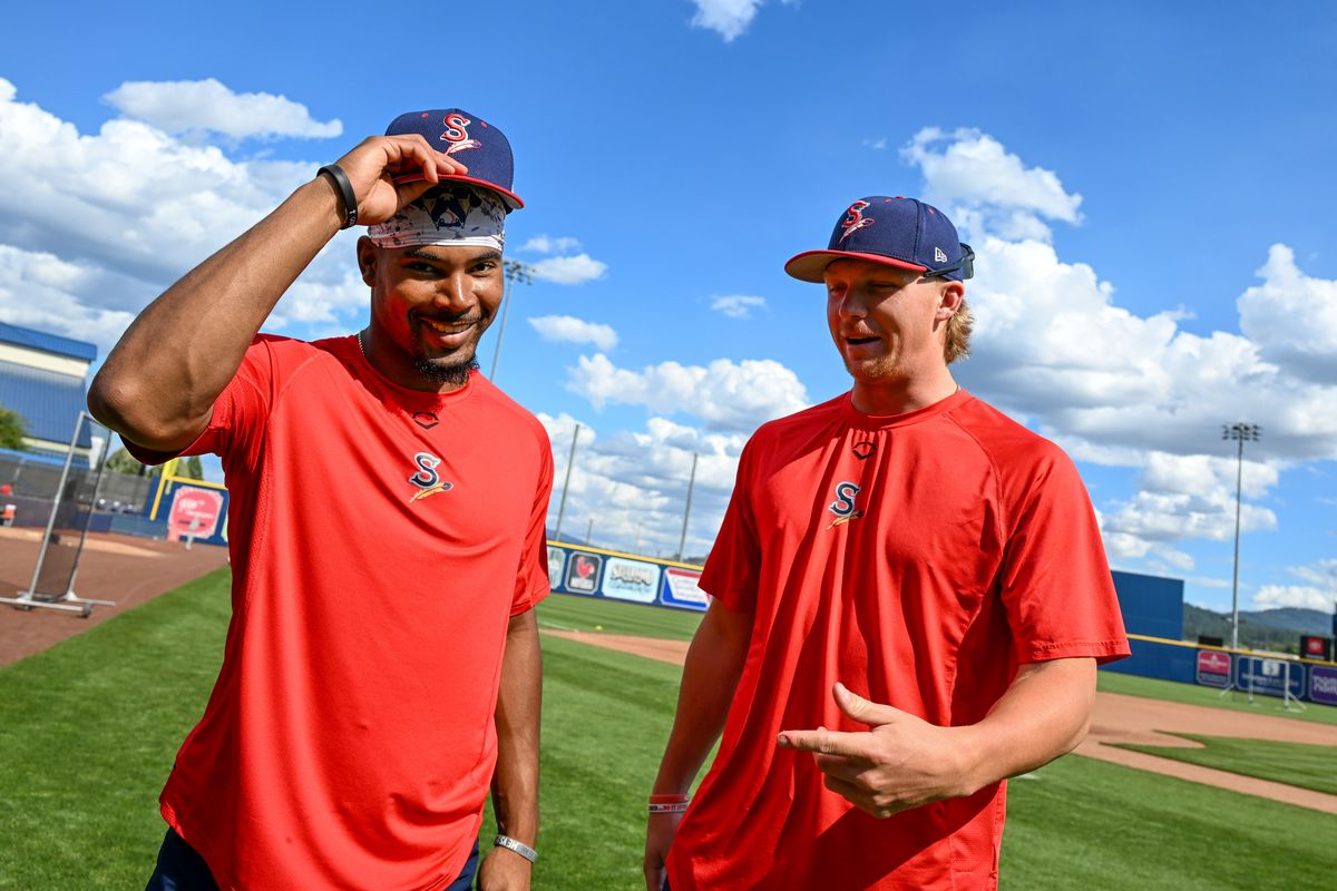 Spokane Indians teammates Tevin Tucker, left, and Konner Eaton were high school teammates in Virginia. They are shown on July 10 at Avista Stadium. (Jesse Tinsley/THE SPOKESMAN-REVI)