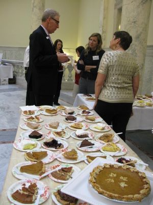 Sen. Bob Nonini, R-Coeur d'Alene, enjoys the Idaho Coalition of Home Educators' annual "Pie Day" at the state Capitol on Wednesday (Betsy Russell)