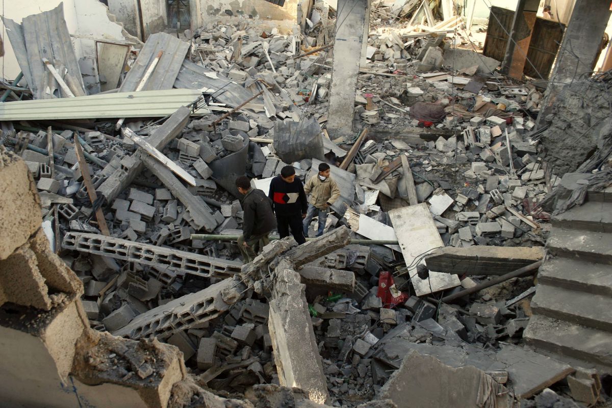 Palestinians inspect the rubble of a destroyed building following Israeli forces’ operations in Rafah refugee camp, southern Gaza Strip, on Tuesday. Associated Press photos (Associated Press photos / The Spokesman-Review)