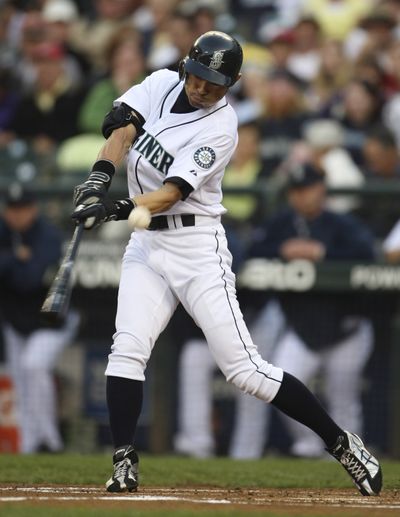Ichiro had two hits in his first game back with the Mariners since injuring his calf Aug. 23. (Associated Press / The Spokesman-Review)