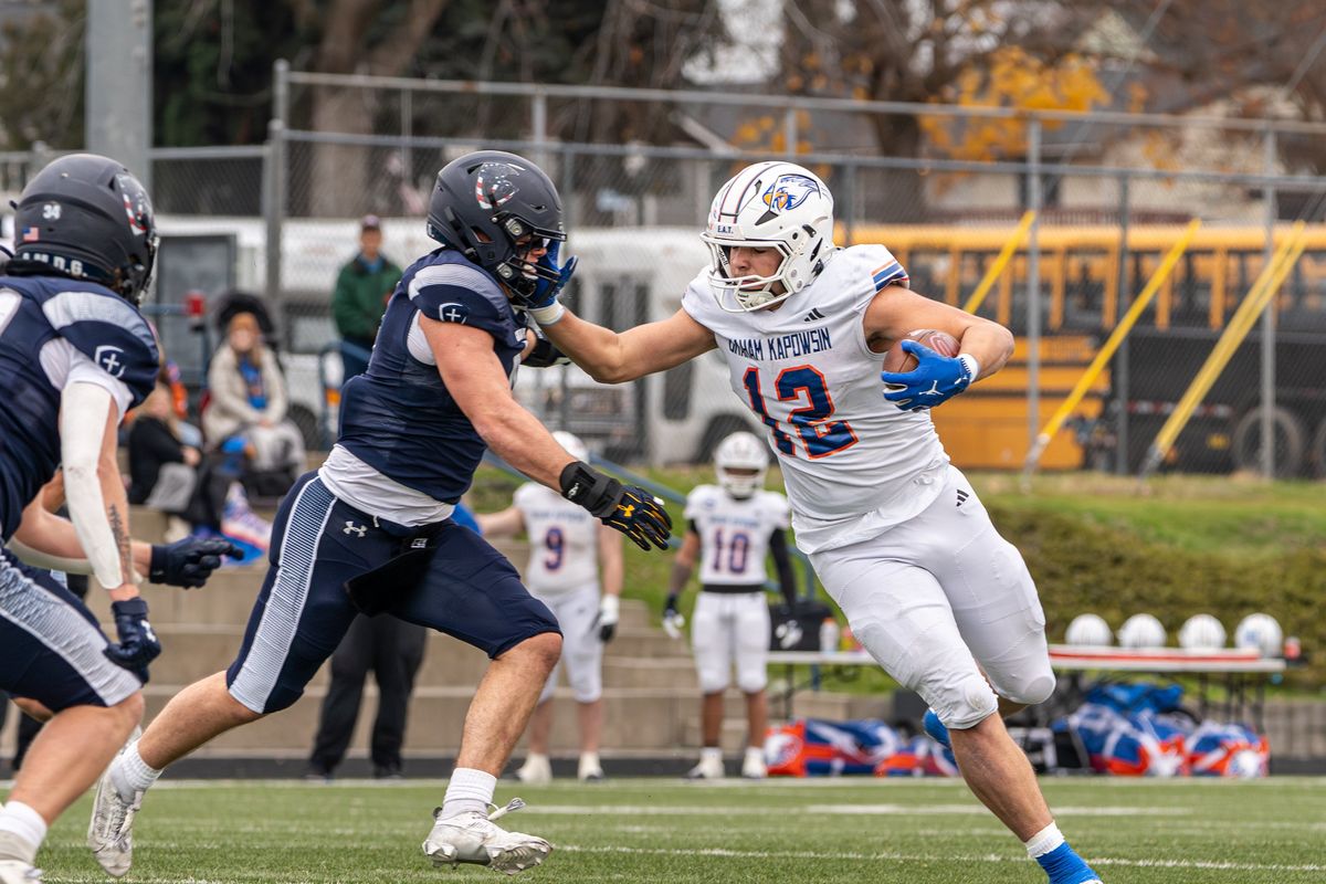 Graham-Kapowsin’s Blake Pearson carries the ball against Gonzaga Prep during a playoff game on Saturday at Gonzaga Preparatory School.  (Dominic Faagau/For The Spokesman-Review)