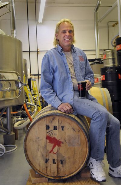 Terry Hackler of Twelve String Brewing in Spokane Valley has been experimenting with barrel aging his beers, using whiskey barrels from Dry Fly Distillery and wine barrels from other sources (Jesse Tinsley)
