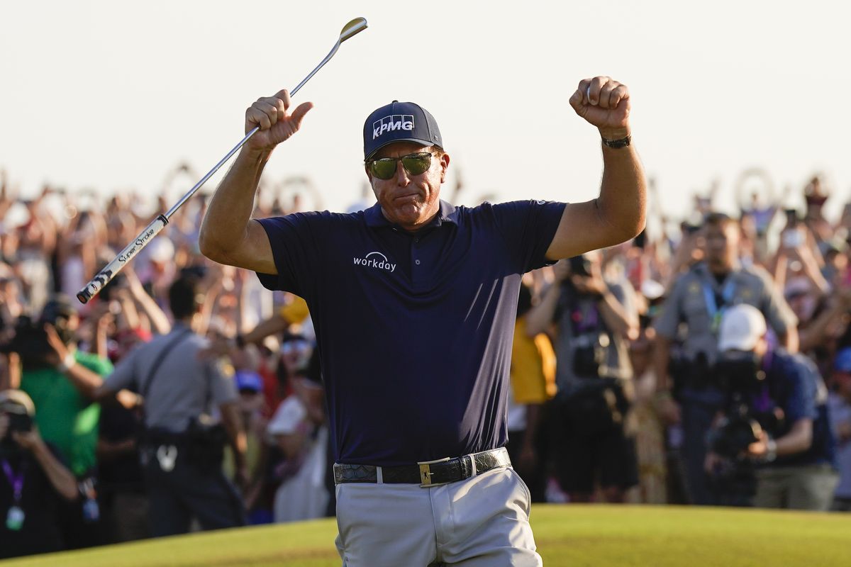 Phil Mickelson celebrates after winning the final round at the PGA Championship golf tournament on the Ocean Course, Sunday in Kiawah Island, S.C.  (David J. Phillip)