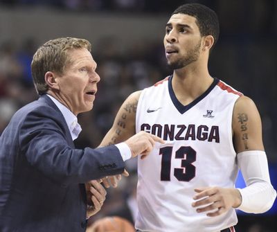 Head coach Mark Few rallies guard Josh Perkins (13) against Saint Mary's during the second half of a college basketball game on Saturday, Feb 20, 2016, at The McCarthey Athletic Center in Spokane, Wash. St. Mary's won the game 63-58. (Tyler Tjomsland/SR)