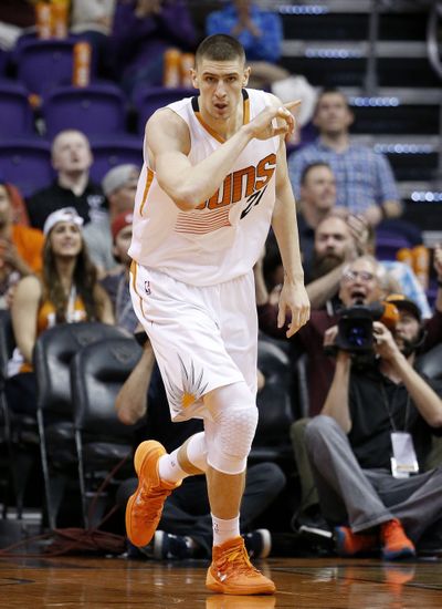 Basketball is the outlet 7-foot Phoenix Sun Alex Len uses to distance himself from a war that’s tearing apart his native Ukraine. (Associated Press)