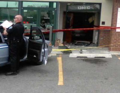 A elderly man drove his car into the Department of Licensing office in Spokane Valley today. (KHQ.com)