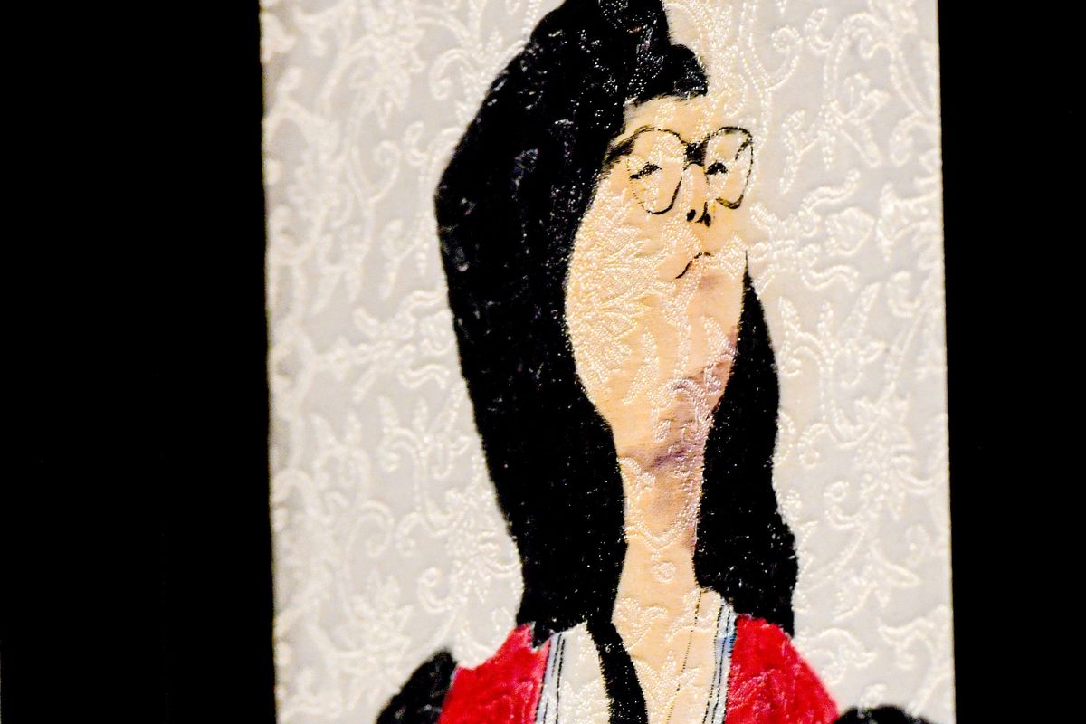Self-portraits on brocade by Remelisa Cullitan is part of the Terrain exhibit “Hidden in Plain Sight” hosted by APIC Spokane for heritage month. A closing reception was Friday night at Terrain.  (Kathy Plonka/The Spokesman-Review)